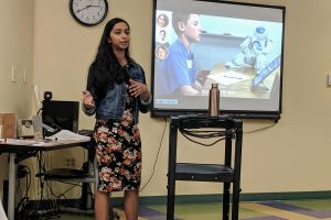 Gopika Ajaykumar presents her latest robotics research at a Girl Scouts robotics workshop at the Maryland Science Center.