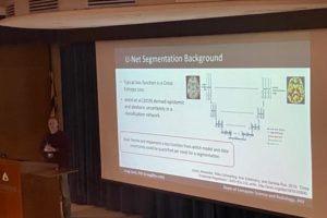 Craig Jones presents a slide titled "U-Net Segmentation Background."