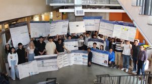 Spring 2023 Natural Language Processing: Self-Supervised Models students hold up their posters.