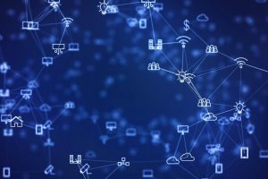 Icons of clouds, lightbulbs, people, houses, and wifi interconnected on a dark blue background.