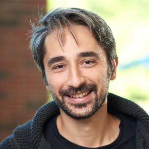 Headshot of Murat Kocaoglu.