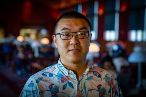 Headshot of Yaxing Yao in a restaurant.