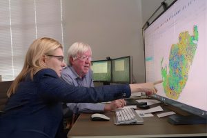 Janis Taube and Alex Szalay working on the AstroPath platform. The platform uses astronomy algorithms to map tumor biomarkers and identify predictive biomarkers for cancer immunotherapy. 