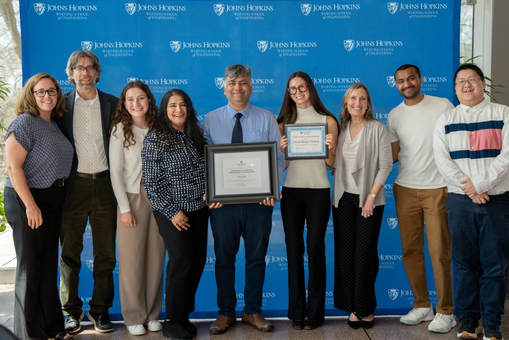 Gagan Garg poses with his award and various colleagues and students from over the years, including Sara Miner More, Maria Romo Nichols, and Joanne Selinski. Nichols also holds her award.