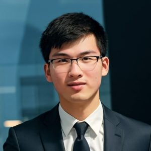 Headshot of Kelvin Wang in a suit.
